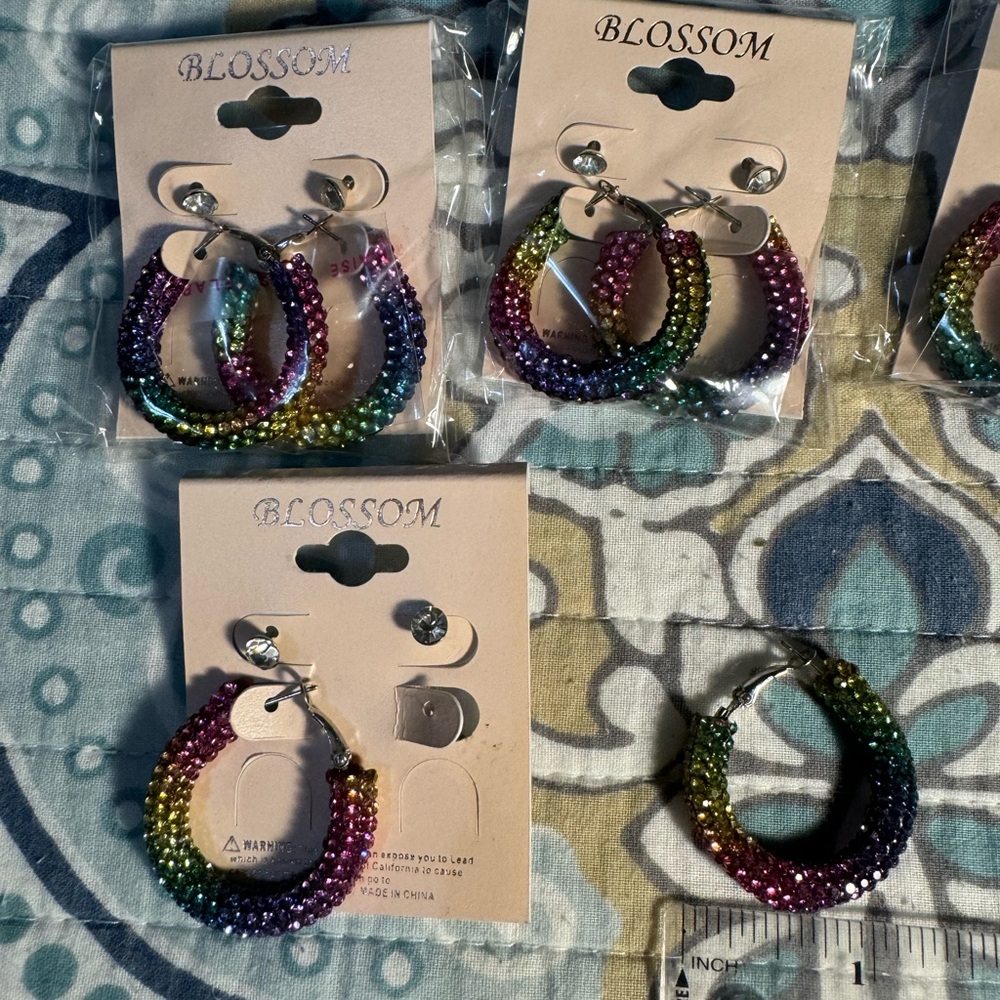 Small rainbow Rhinestone embellished hoop earrings.